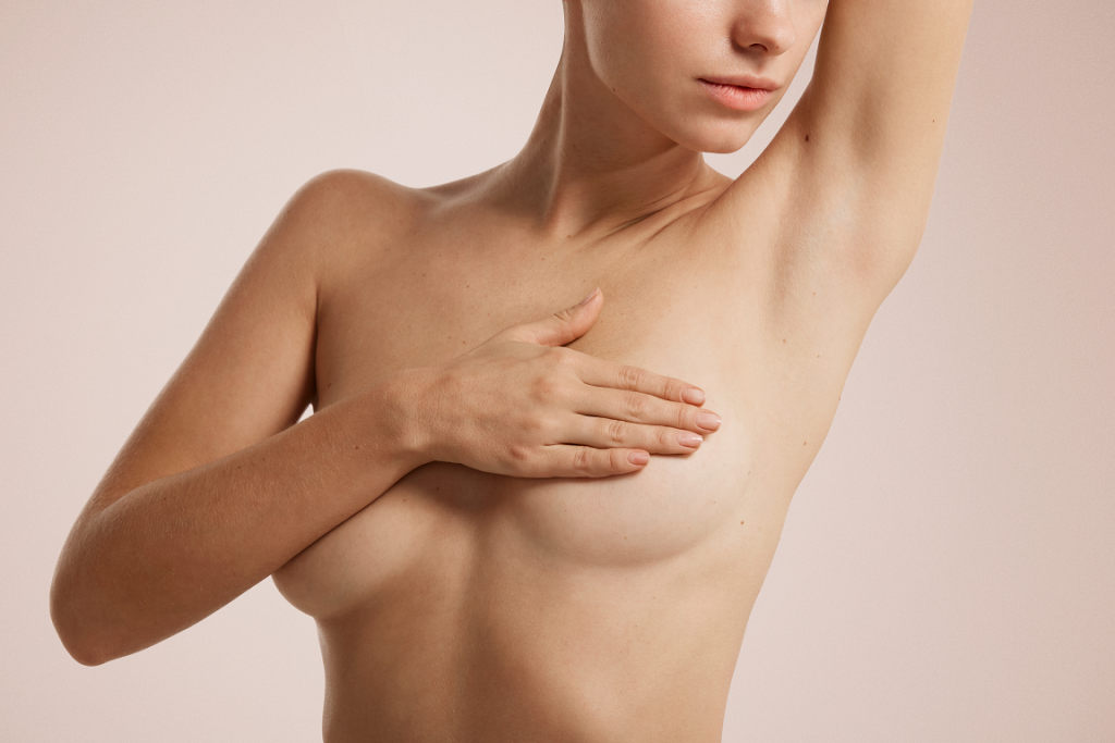Do Your Large Breasts Cause Back Pain? Here's What To Do